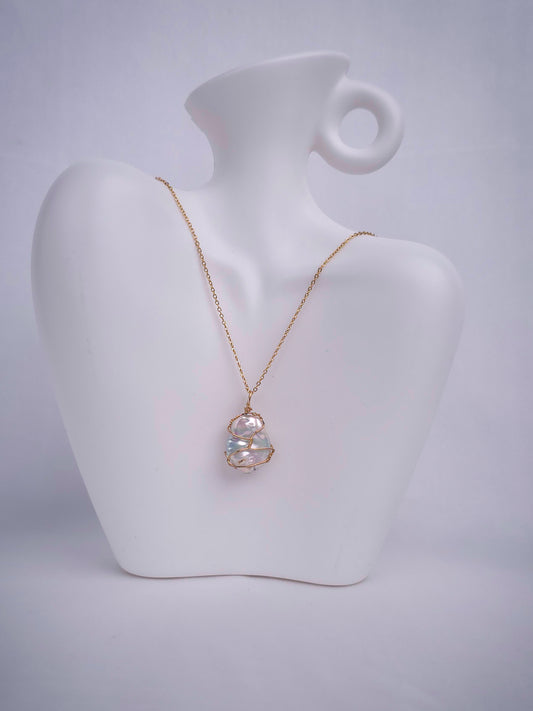 Caged Baroqued Pearl Locket